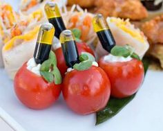 small tomatoes and other food items on a plate