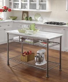 a kitchen island with a mixer on it