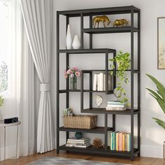 a living room with a large book shelf in the corner and a rug on the floor