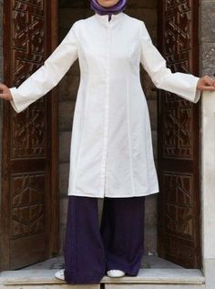 Pima Cotton Princess Seam Tunic- Get inspired and find your own unique style for woman of all ages. Casual interesting and cool fashion. Real clothes for real women, streetwear.  #womanofstyle #personalstyle  #fashioninspiration #eclecticstyle  #uniquestyle  #whiteshirts #fashion #casualtops #tunics Classic Fitted Cotton Kurta, Elegant Stand Collar Kurta For Spring, Cotton Kurta With Stand Collar And Placket, White Fitted Kurta With Stand Collar, Classic Fitted Kurta For Workwear, Fitted Stand Collar Kurta For Workwear, Fitted Kurta With Stand Collar For Workwear, Fitted Casual Kurta For Workwear, White Long Sleeve Kurta With Buttons