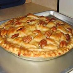 a pie sitting on top of a metal pan