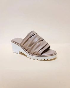 Open Toe Casual Slide Platform sandals Style: CASUAL,MULES Embellishment: WINKLE STRAP Length: 2.5" Closure: SLIDE Heel Height: 2.5" Width: 3.5" Made In: ChinaMaterial Composition: Soft Crinkle PUCare Instructions: HAND WASH ONLY