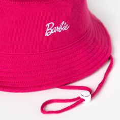 Description: Be an everyday hero with Barbie™! Our Barbie™ Magenta Hero Booney Hat is made with ultra-soft, flexible FitKnit™ technology, featuring “Barbie” embroidered in white on the front with an adjustable chin strap to create the perfect fit. Features: Temperature-regulating fabrication UPF 50+ Sun Protection Built-in moisture-wicking sweatband Every purchase furthers the fight against pediatric cancer Details: Sizing: One size Content: 51% Viscose, 35% Polyester, 14% Nylon Care: Hand wash Booney Hat, Love Your Melon, Everyday Heroes, Very Hungry Caterpillar, Hungry Caterpillar, Kids Hats, Upf 50, Baby Shop, Sun Protection