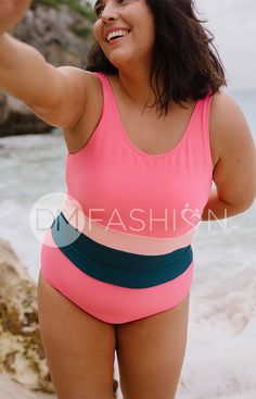 A fun and sporty swim top that is supportive and loves movement! This Exclusive Design includes our signature full bra support, a cut V-back, color blocking to minimize your figure and comfortable straps for a perfect fit! A comfortable and flattering fit with structured support designed for all body shapes! This Midkini supports up to a DDD bust! Product Fit + Details: Fully lined Color block ribbed Full bra support - AA-DD cup sizes Available in Junior's and Women's lengths Comfortable straps Pink Athleisure Swimwear For Beach Season, Pink Color Block Nylon Swimwear, Sporty Pink Tankini For Pool, Pink Racerback Swimwear, Pink Seamless Athleisure Swimwear, Color Block Stretch Swimwear For Workout, Pink Racerback Swimwear For Swimming, Sporty Pink Tankini For Beach Season, Stretch Color Block Swimwear For Workout