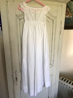 "This beautiful gown dates to around 1890 or earlier. It measures 10\" from armpit to armpit and is 37\"long from shoulder to hem. It is hand sewn and in very good condition, there are two tiny marks please see pics. It has a lace yoke and has lace to the cuffs and hem. The fabric is strong and it is clean and fresh. Ideal for a bisque head doll or theatre, tv props." Cotton Maxi Dress With Empire Waist For Daywear, Empire Waist Maxi Dress With Fitted Bodice For Daywear, White Maxi Dress With Fitted Bodice For Daywear, Spring Wedding Cotton Gown, Regency Style Victorian Dress For Vintage Events, Fitted Victorian Dress With Broderie Anglaise For Wedding, Cotton Victorian Dress With Fitted Bodice For Daywear, Victorian Broderie Anglaise Dresses For Daywear, Daywear Dresses With Historical Design And Fitted Bodice