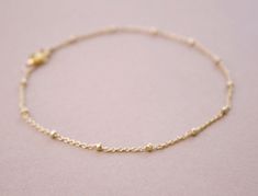 Hey, I found this really awesome Etsy listing at https://www.etsy.com/listing/77107726/satellite-layering-bracelet-14kt-gold Delicate Gold Bracelet With Satellite Chain, Dainty Yellow Gold Chain Bracelet With Tiny Beads, Deer Jewelry, Dainty Gold Bracelet, Turquoise Bead Bracelet, Bracelet Chain, Vermeil Jewelry, Layered Bracelets, Simple Jewelry