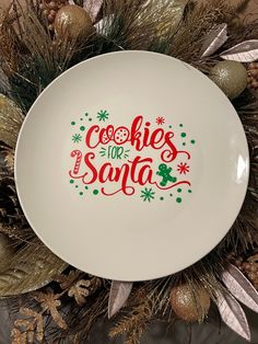 a white plate with the words cookies for santa on it