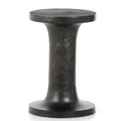 a black metal stool on a white background