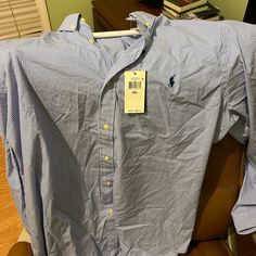 Shirt Is Brand New With Tags Ralph Lauren Blue Collared Shirt, Blue Ralph Lauren Cotton Tops, Blue Collared Ralph Lauren Shirt, Ralph Lauren Blue Relaxed Fit Shirt, Blue Relaxed Fit Ralph Lauren Shirt, Casual Blue Ralph Lauren Shirt, Ralph Lauren Blue Collared Top, Ralph Lauren Long Sleeve Cotton Top, Casual Ralph Lauren Button-up Top