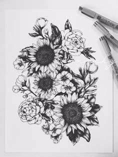 an ink drawing of sunflowers and roses on paper with markers next to it