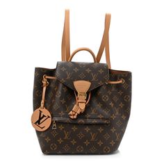 This is the authentic LOUIS VUITTON Monogram Montsouris PM. This stylish backpack is crafted ofclassic Louis Vuitton monogram coated canvas in brown. It features vachetta leather trim, rolled vachetta handle, vachetta adjustable shoulder straps, and polished gold tone hardware. The front flap opens with a belt buckle closure to a brown fabric interior with a flat pocket. Luxury Backpack With Leather Handles, Luxury Coated Canvas Backpack With Leather Handles, Luxury Backpack With Leather Handles And Coated Canvas, Luxury Coated Canvas Backpack, Designer Coated Canvas Backpack With Leather Handles, Luxury Monogram Canvas Backpack, Elegant Monogram Canvas Backpack For Travel, Classic Brown Monogram Canvas Backpack, Designer Monogram Canvas Backpack For Travel