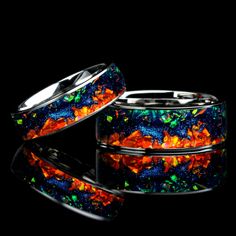 "💕 Unleash the beauty of the cosmos with our stunning Carina Nebula Galaxy Ring. This unique his and hers fire opal wedding band set features 8mm and 6mm bands with a mesmerizing mountain pattern, inspired by the mesmerizing night sky. Each ring is handcrafted with striking flashes of color, mimicking the cosmic wonder of the Carina Nebula as captured by the James Webb telescope. Make a statement with this one-of-a-kind ring set that symbolizes your cosmic connection to each other. 💕 Experienc Cosmic Ring, Webb Telescope, Mountain Pattern, Cosmic Connection, Couples Rings, Opal Wedding Band, Nebula Galaxy, Galaxy Ring, Carina Nebula