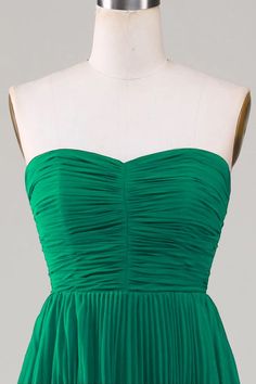 strapless green pleated A-line tiered party dress Green Strapless Ruffle Dress For Party, Green Ruffled Strapless Party Dress, Green Ruffled Strapless Dress For Party, Green Strapless Dress With Ruffles For Party, Green Strapless Dress With Sweetheart Neckline For Gala, Bridesmaid Strapless Dress With Ruffled Fitted Bodice, Evening Strapless Chiffon Dress With Ruffles, Chiffon Strapless Dress With Ruffles For Evening, Strapless Bridesmaid Dress With Pleated Bodice