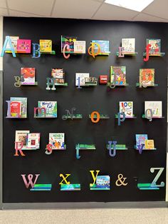 a bulletin board with various books on it