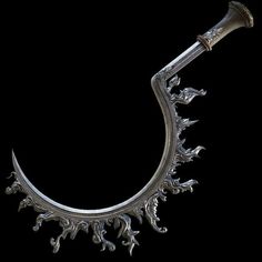 an ornate silver handle on a black background