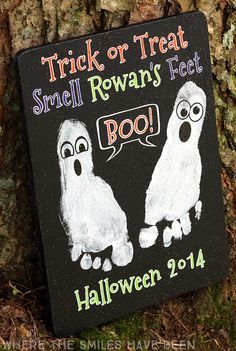 a sign that says trick or treat, small rowan's feet boo halloween 2014