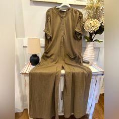 Free People Beach Size Small Nwot Never Worn Soft Cotton Romper Khaki Jumpsuits And Rompers For Summer Loungewear, Summer Khaki Relaxed Fit Jumpsuits And Rompers, Beach Season Loungewear Jumpsuits And Rompers With Relaxed Fit, Relaxed Fit Jumpsuits And Rompers For Beach Loungewear, Beach Season Jumpsuits And Rompers, Free People Beach, Cotton Romper, Free People Pants, Pant Jumpsuit