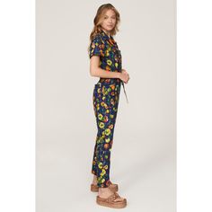 Multicolor printed cotton (100% Cotton). Jumpsuit. Short sleeves. Collar. Front zipper fly with button closure. 58" from shoulder to hemline. 28" inseam. 11.5" rise. 7" leg opening Imported. Spring Casual Multicolor Print Jumpsuits And Rompers, Retro Summer Workwear Jumpsuits And Rompers, Retro Summer Jumpsuits And Rompers For Work, Cotton Floral Print Jumpsuits And Rompers For Loungewear, Cotton Jumpsuits And Rompers With Floral Print For Loungewear, Summer Workwear Printed Jumpsuits And Rompers, Printed Multicolor Cotton Jumpsuits And Rompers, Multicolor Printed Cotton Jumpsuits And Rompers, Casual Multicolor Jumpsuits And Rompers For Work