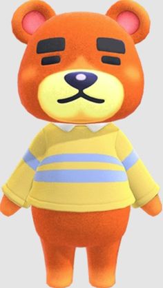 an orange teddy bear wearing a yellow and blue striped shirt