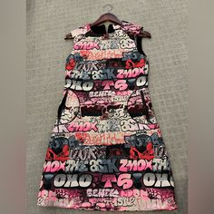 Wore For A Photo Shoot. Very Neat Print Dress. Shiny Metallic Writing. Thick Quilted Material So Easy To Pack. Side Pockets Pink Graphic Print Party Dress, Pink Graphic Print Mini Dress, Graffiti Dress, Quilt Material, Pink Black, Photo Shoot, Print Dress, A Photo, Colorful Dresses