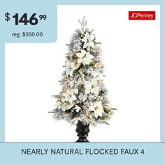 a fake christmas tree with white flowers and snowflakes is on sale for $ 46 99