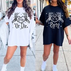 two women walking down the street wearing matching t - shirts that say or die and harry potter