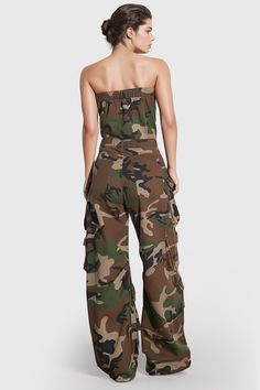 Stay on trend with this fashionable long jumpsuit featuring an army pattern and classic denim. This strapless one-piece features a stylish blend of cargo pockets and wide legs for a unique look that is both stylish and comfortable.Fabric: Cotton, Polyester Utility Denim Cargo Pocket Overalls, Utility Denim Overall With Cargo Pockets, Casual Camouflage Sleeveless Jumpsuits And Rompers, Summer Overalls With Cargo Pockets, Spring Cargo Style Overalls, High Waist Strapless Jumpsuit With Pockets, Summer Denim Jumpsuit With Cargo Pockets, Summer Denim Cargo Jumpsuit, Fitted Cargo Style Jumpsuits And Rompers