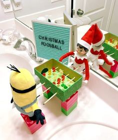 two elfs are playing chess in the bathroom