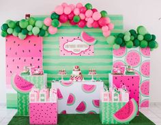 a watermelon themed birthday party with balloons