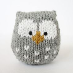 an owl knitted in grey and white