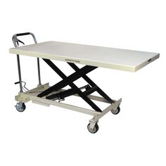 a white table with wheels on it and a black handlebar attached to the top