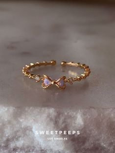 Product Details Care - High Quality Gold Plated Over Brass - Brass: Copper Zinc... Sweetpeeps Jewelry, Korean Rings, Enchanting Jewelry, Jewellery Design Sketches, Purple Bow, Glamour Nails, Stylist Tattoos, Purple Bows, Bow Ring