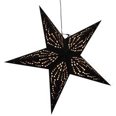 a black star shaped light hanging from a string on a white background, with small dots in the center