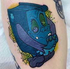 an image of a cartoon character tattoo on the leg