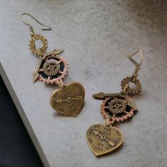 Nwt Steampunk Bronze Dangle Earrings Description: Embrace The Uniqueness Of Our Stunning Bronze Rustic Dangle Earrings. Crafted With Intricate Clock Gears And Heart Designs, These Earrings Beautifully Combine Steampunk Charm With Vintage Elegance. Each Pair Is Handcrafted, Showcasing Exceptional Artistry And Attention To Detail That Makes Them A Standout Accessory For Any Outfit. Perfect For Those Who Love The Unconventional, These Earrings Serve As A Striking Conversation Starter While Reflecti Clock Gears, Heart Designs, Vintage Elegance, Jewelry Inspo, Individual Style, Heart Design, Your Style, Jewelry Box, Vintage Inspired