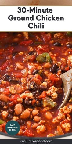 the 30 minute ground chicken chili recipe is shown in a pan with a ladle