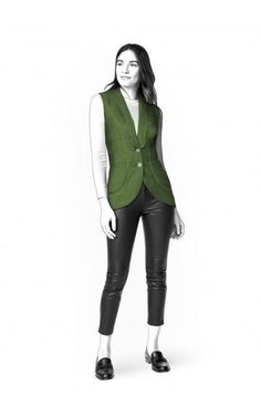 a woman is standing in front of a white background wearing a green vest and black pants