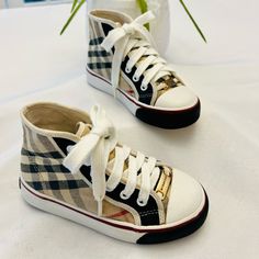 Burberry Unisex Check High Top Sneakers. Euc No Rips, No Stains, No Holes. Inside No Sings Of Wear. Outside Still Looks Like New In My Opinion But You Can Check All The Photos For A Better Reference. I Tried To Take Photos In All The Possible Positions To Get A Better Idea. Retail $420 + Taxes. Europe Size: Girls/Boys Europe 27, Usa Size 10.5. I Didn’t Keep The Box. They Are Super Cute And Very Comfortable! 100% Authentic Burberry. Burberry Shoes, In My Opinion, High Top, I Tried, Kids Shoes, Top Sneakers, High Top Sneakers, Burberry, The Box