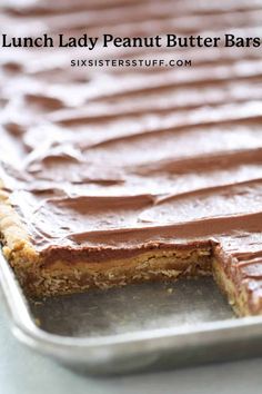 a chocolate peanut butter bar is cut in half and ready to be served on the table