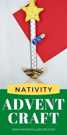 a wooden ruler with a star on top and the words nativity above it