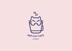 a cat that is sitting in a cup with steam coming out of its eyes and the words kopicat cafe on it