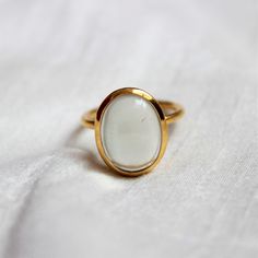 D E T A I L S - Material: 92.5 sterling silver Stone: Crystal The fit: true to US ring size Finish: smooth and Gold Plated to a high shine S H I P P I N G & P R O D U C T I O N - My current production time is 2-6 business days, which means after those days are up, your order ships! I make everything custom to order, by hand, but I promise you it's worth the wait! R U S H - M Y - O R D E R - If you're in a rush to get your pretty new pieces, please send me a message and I'll let you know just Gold Sterling Silver Moonstone Ring, Timeless White Rings With Vs Clarity, White Rings For Everyday With Round Band, White Oval Jewelry With Bezel Setting, White Sterling Silver Fine Jewelry Engraved Ring, White Signet Ring With Round Band For Anniversary, White Round Band Rings For Everyday, White Si Clarity Jewelry For Promise Ring, White Moonstone Ring With Si Clarity