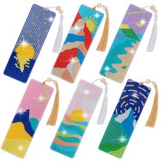 six bookmarks with different designs and tassels