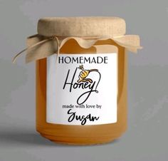 a jar of honey with a bow on the top that says homemade honey made with love by susan