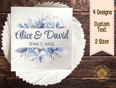 personalized wedding napkins with blue flowers and greenery on them, set of 4