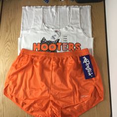 New Hooters Girl Uniform Tank And Shorts Unisex For Women Or Men. Tank Size: Large Shorts Size: Xlarge Tank Is From The Original Hooters In Clearwater Florida. Tank Is Cotton Soft Stretchy And Comfy Shorts Are Silky Soft Some Stretch And Comfy Note The Shorts Don’t Have The Hooters Logo On Them These Shorts Are The Same As The Original Vintage Shorts They Wore In The Beginning Of The Hooters Saga Makes A Great Halloween Costume White Cotton Cheerleading Bottoms, White Cotton Bottoms For Cheerleading, White Cheerleading Shorts For Summer, White Summer Cheerleading Shorts, Girl Uniform, Great Halloween Costumes, Clearwater Florida, Girls Uniforms, In The Beginning