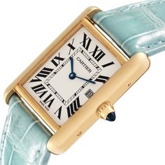 Cartier Tank Louis Yellow Gold Teal Leather Strap Mens Watch W1529756. Quartz movement. 18k yellow gold case 25.0 x 33.0 mm. Circular grained crown set with a blue sapphire cabochon. . Scratch-resistant mineral crystal. Silvered opaline dial with black radial Roman numeral hour markers and inner minute track. Sword shaped blue hands. Date calendar at 3 o'clock aperture. Secret Cartier signature at VII. Teal leather strap with 18K yellow gold tang buckle. Vintage Cartier Yellow Gold Watch, Vintage Yellow Gold Cartier Watch, Vintage Gold Cartier Watch Accessories, Vintage Cartier Gold Watch Accessories, Luxury Engraved Yellow Gold Watches, Luxury Engraved Gold Jewelry And Watches, Luxury Engraved Jewelry And Watches For Anniversary, Designer Gold Cartier Watch, Luxury Engraved Watches For Anniversary