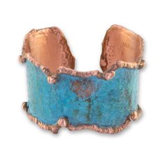 Sizing : 1.75 W x 7" L - Adjustable Material: Solid Copper Rustic Verdigris Patina Made from solid copper, this beautiful cuff boasts a beautiful verdigris patina with molten copper edging, giving it a rustic and luxurious appeal. The inside is designer signed, adding to the unique and high-end feel of this piece. Please note that it is slightly on the heavier side, making it sturdy and durable.To protect the beautiful patina and prevent oxidation, this cuff has been sealed with a triple baked l Green Bohemian Bracelets With Patina, Turquoise Bohemian Cuff Bracelet With Patina, Bohemian Turquoise Cuff Bracelet With Patina, Handmade Turquoise Metal Cuff Bracelet, Bohemian Electroformed Cuff Bracelet Bangle, Bronze Metal Bracelet With Patina, Blue Patina Cuff Bracelet As Gift, Blue Cuff Bracelet With Patina As A Gift, Blue Patina Cuff Bracelet As A Gift