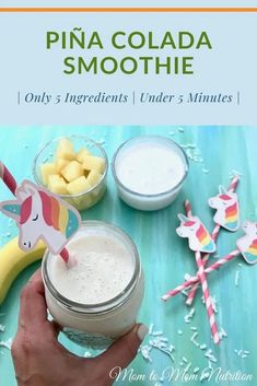 a person holding a glass with some fruit in it and the text pina colada smoothie only 5 ingredients under 3 minutes