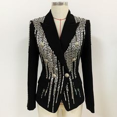 The classic and simple lines of this viscose blend sand cady double-breasted jacket are overturned by retro details. Its tight-fit, concave shoulders and large lapel remind of Bianca Jagger’s 70’s style. Metal jewel buttons fastening. Two flap pockets. Black lining. Sequin Suit, Latest Designer Dresses, Fitted Blazer Jacket, Pearl Embroidery, Formal Suit, Beaded Jacket, Power Dressing, Top Skirt Set, Long Sleeve Sequin